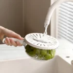 Égouttez et faites tremper facilement avec ce bol de drainage multifonctionnel