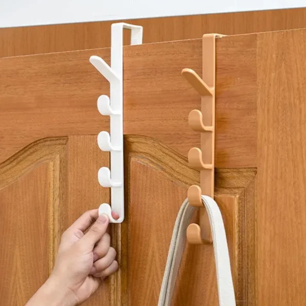 Compact over-the-door hat rack for space-saving storage, perfect for organizing hats, scarves, and accessories in small spaces